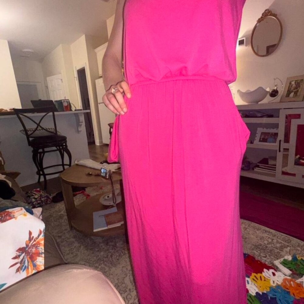 long hot pink maxi dress with elastic waist and pockets.
